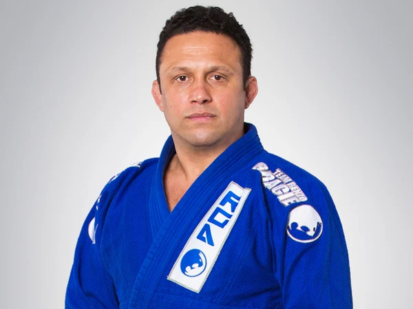 Renzo Gracie wearing a blue Brazilian jiu-jitsu gi